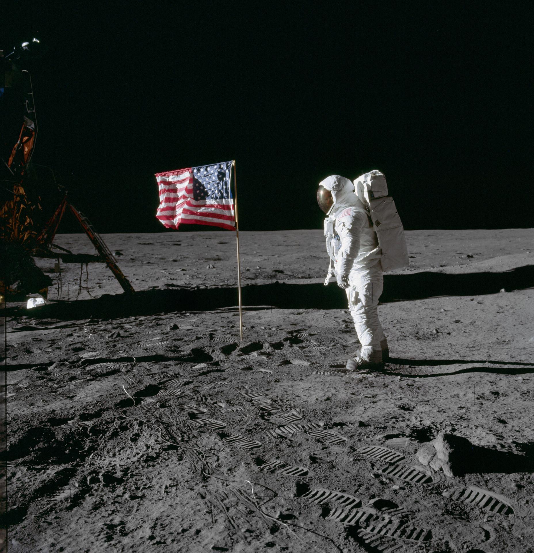 Buzz Aldrin stands beside the U.S. flag during Apollo 11.